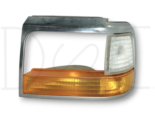 92-97 Ford F250 F350 LH Left Driver Parking Light Headlight Bezel Trim Surround used with light wear and small blemishes, compatible with 1992-1997 F-250 and F-350 trucks.