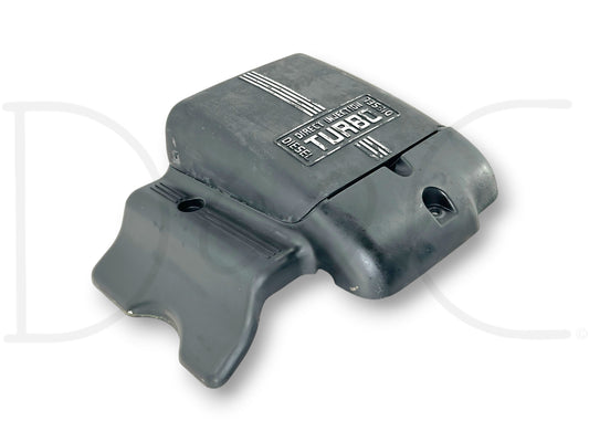 94-97 Ford 7.3 7.3L Powerstroke Turbo Diesel Engine Top Cover OEM F5Ta-6A949-Aa used engine cover with missing hinge pins and undercoating residue, compatible with Ford F-250 and F-350 trucks.