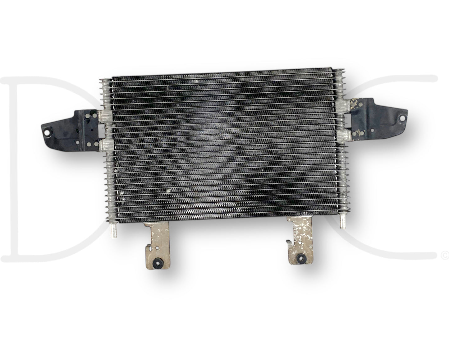 Used OE 05-07 Ford F250 F350 6.0 6.0L Transmission Trans Cooler 5R110 5C34-7A095-Cb with light wear, featuring metal fins and mounting brackets, compatible with Ford Super Duty models including F-250, F-350, F-450, and F-550 from 2005 to 2007.