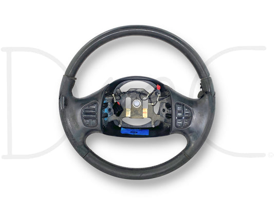 05-07 Ford F250 F350 Black Leather Steering Wheel W/ Stereo Temp Cruise *Blem* showing a used, blemished condition with leather wrap missing on the top half and heavily worn surface, buttons also worn and damaged, compatible with 2005-2007 Ford Super Duty trucks.