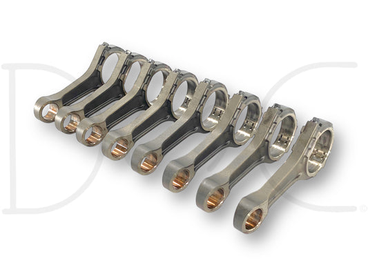 03-07 Ford 6.0 6.0L Powerstroke Diesel Connecting Rods OE Rod Set (8) 1834675C1 made of durable metal, featuring precision-machined surfaces designed for use in Ford 6.0L Powerstroke engines from model years 2003 to 2007, used with light wear visible.