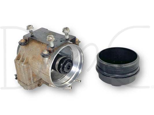 03-07 Ford F250 F350 6.0 6.0L Diesel Fuel Pump Filter Separator 6C34-9G282-AB used part with light wear, removed from a 2007 Ford F-250 Lariat 6.0L Diesel, featuring metal and plastic components including a threaded cap for fuel filtration systems.