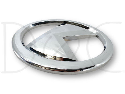 Kubota Svl95-2 Svl Skid Steer Track Loader Rear Door Badge Chrome K Emblem OE, used with light wear and small scratches, chrome finish, designed for reliable replacement on skid steer track loaders.
