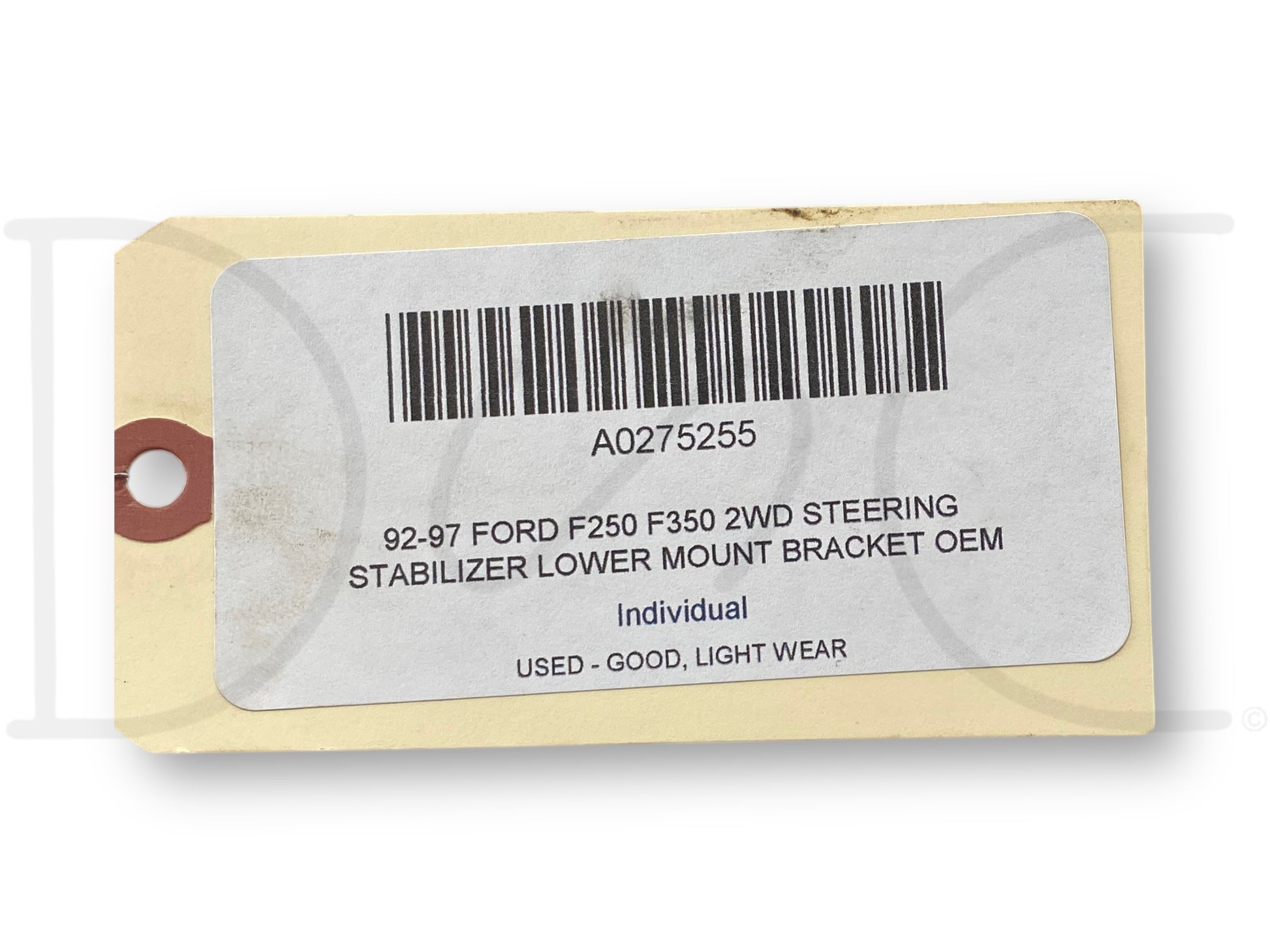 Tag with barcode and printed label indicating part number A0275255 for 92-97 Ford F250 F350 2WD Steering Stabilizer Lower Mount Bracket OEM, used condition with light wear